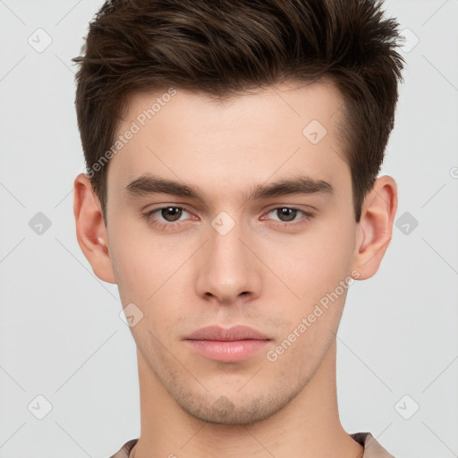 Neutral white young-adult male with short  brown hair and brown eyes