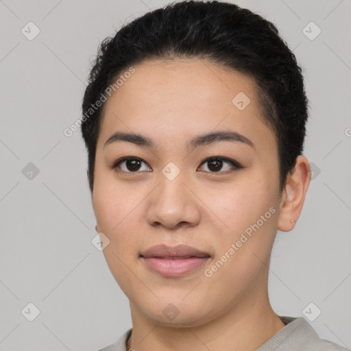 Joyful white young-adult female with short  black hair and brown eyes