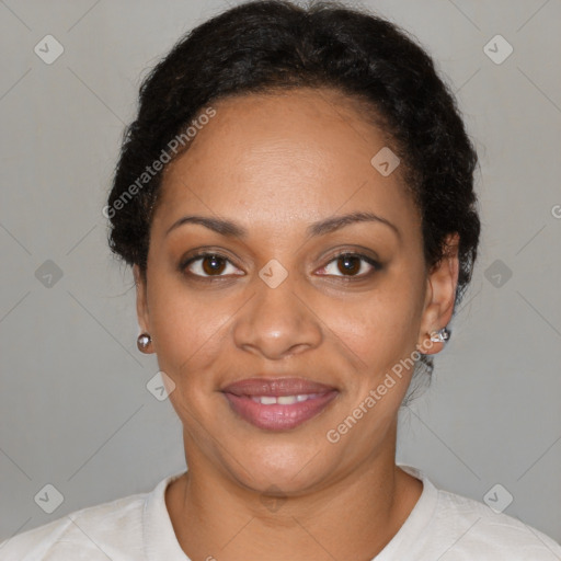 Joyful black adult female with short  black hair and brown eyes