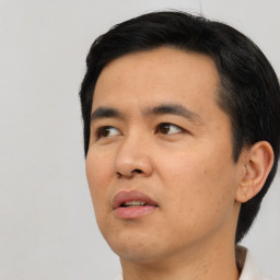 Neutral asian young-adult male with short  black hair and brown eyes