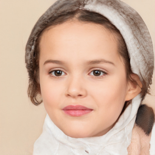 Joyful white child female with short  brown hair and brown eyes