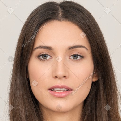 Neutral white young-adult female with long  brown hair and brown eyes