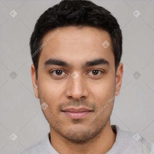 Neutral latino young-adult male with short  black hair and brown eyes