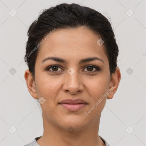 Joyful latino young-adult female with short  brown hair and brown eyes