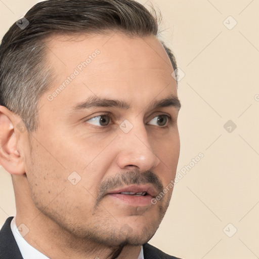 Neutral white young-adult male with short  brown hair and brown eyes