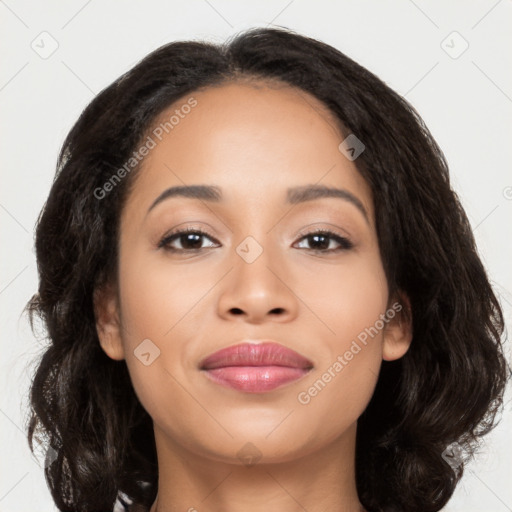 Joyful latino young-adult female with long  brown hair and brown eyes