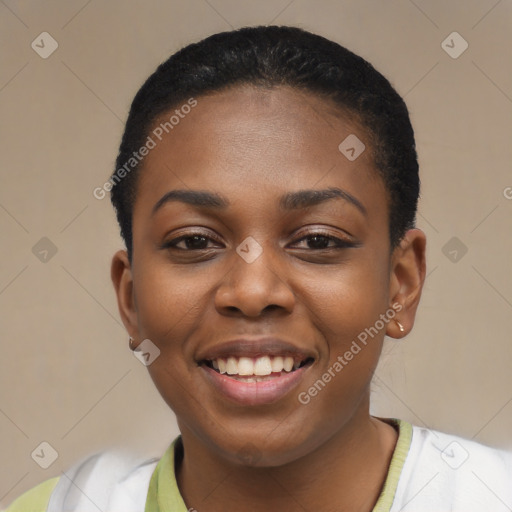 Joyful black young-adult female with short  black hair and brown eyes