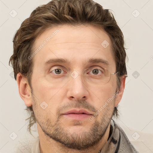 Joyful white adult male with short  brown hair and grey eyes