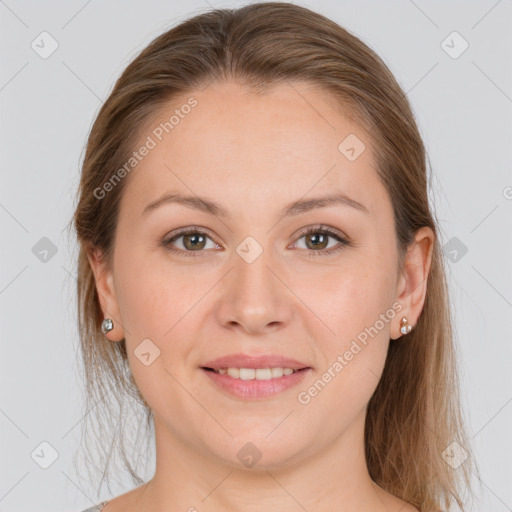 Joyful white young-adult female with medium  brown hair and grey eyes