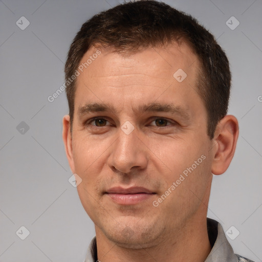 Joyful white adult male with short  brown hair and brown eyes