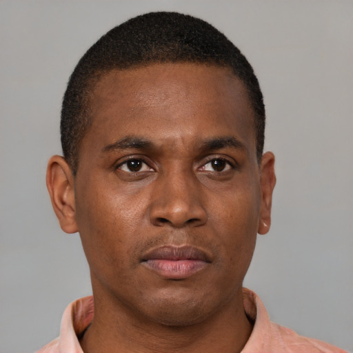 Neutral black young-adult male with short  brown hair and brown eyes