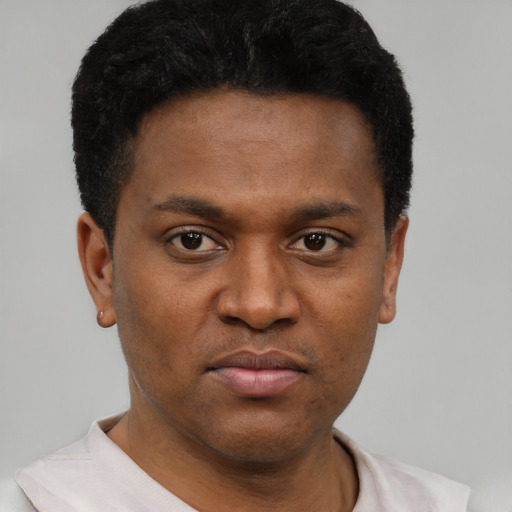 Neutral latino young-adult male with short  brown hair and brown eyes