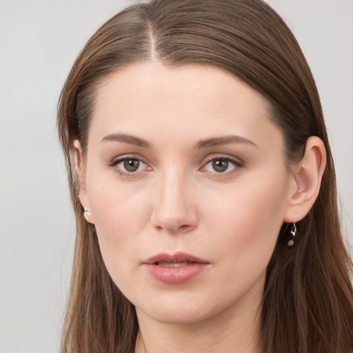 Neutral white young-adult female with long  brown hair and grey eyes