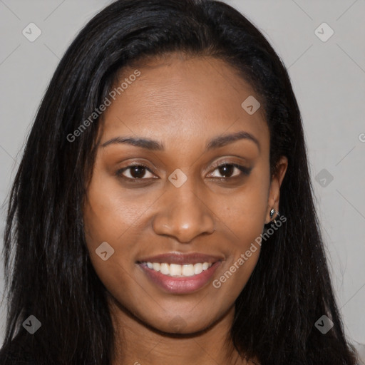 Joyful black young-adult female with long  brown hair and brown eyes