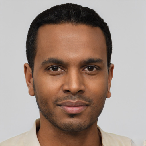 Neutral black young-adult male with short  black hair and brown eyes
