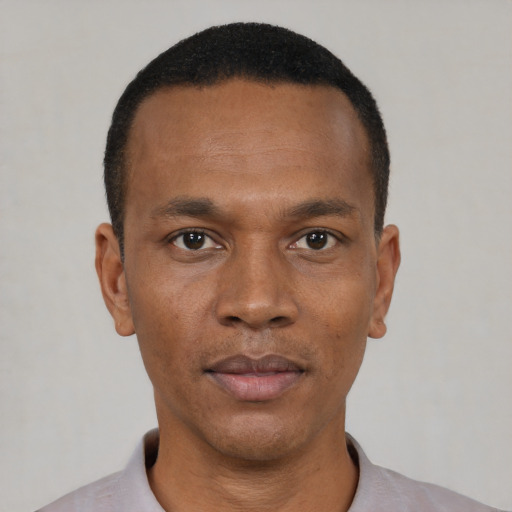 Neutral black young-adult male with short  black hair and brown eyes