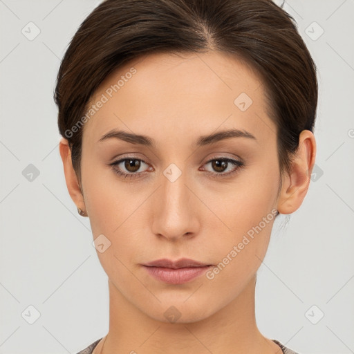 Neutral white young-adult female with short  brown hair and brown eyes