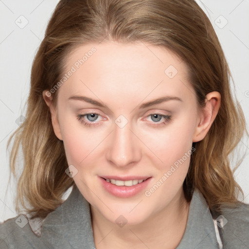 Joyful white young-adult female with medium  brown hair and blue eyes