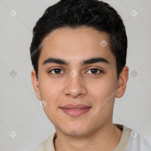 Joyful white young-adult male with short  black hair and brown eyes