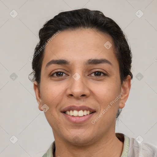 Joyful white young-adult female with short  brown hair and brown eyes