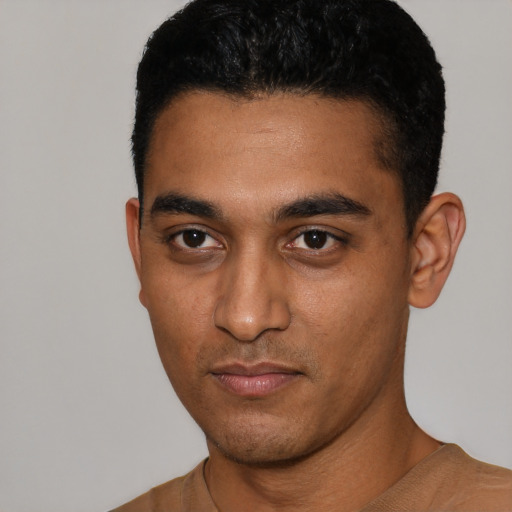 Neutral latino young-adult male with short  black hair and brown eyes