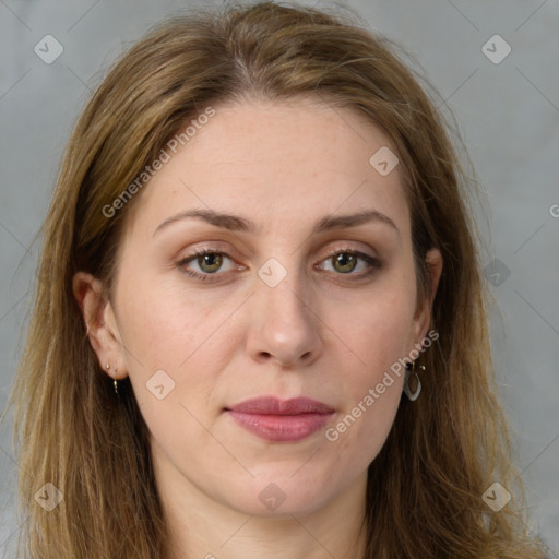 Joyful white young-adult female with long  brown hair and grey eyes