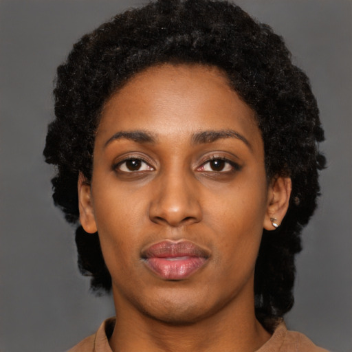 Neutral black young-adult female with short  black hair and brown eyes