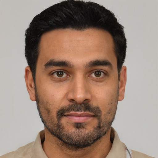 Neutral latino young-adult male with short  black hair and brown eyes