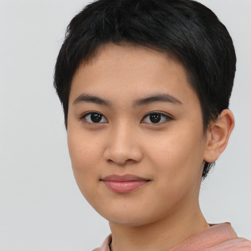 Joyful asian young-adult female with short  black hair and brown eyes
