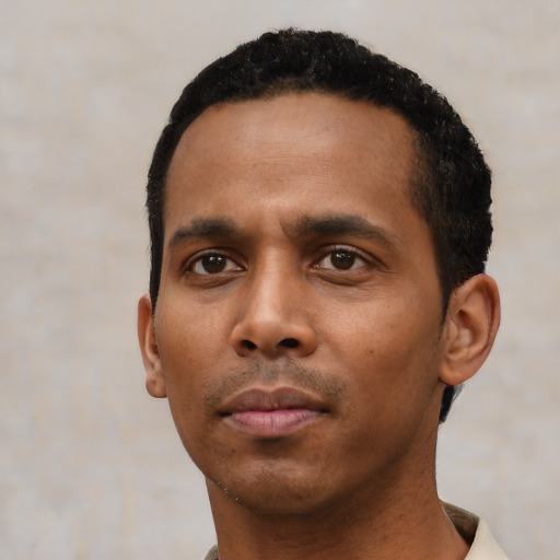Neutral black young-adult male with short  black hair and brown eyes