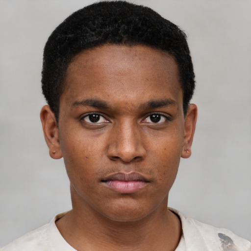 Neutral black young-adult male with short  black hair and brown eyes