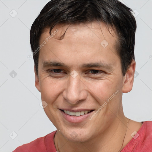 Joyful white young-adult male with short  brown hair and brown eyes