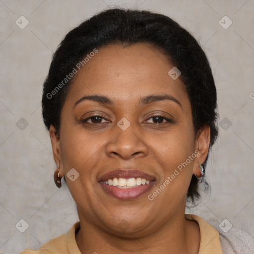 Joyful latino adult female with short  brown hair and brown eyes