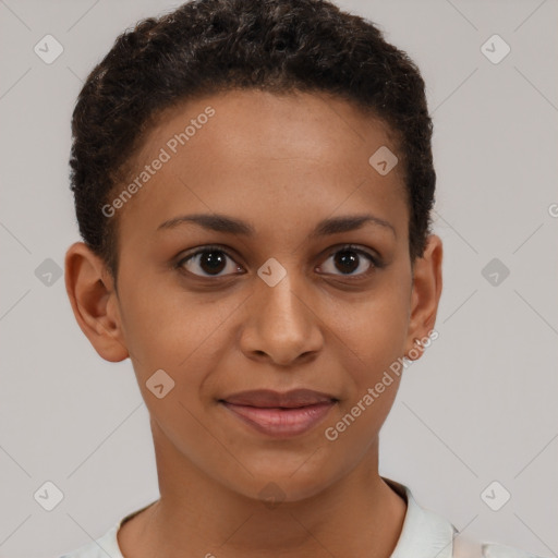 Joyful black young-adult female with short  brown hair and brown eyes