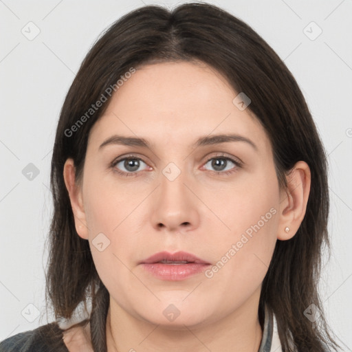 Neutral white young-adult female with medium  brown hair and brown eyes