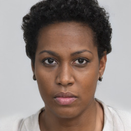 Neutral black young-adult female with short  brown hair and brown eyes