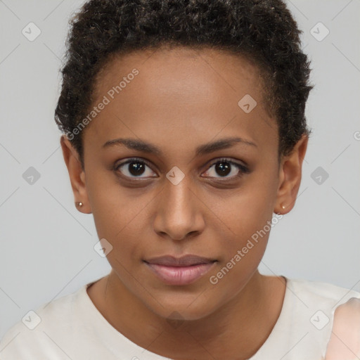 Joyful black young-adult female with short  brown hair and brown eyes