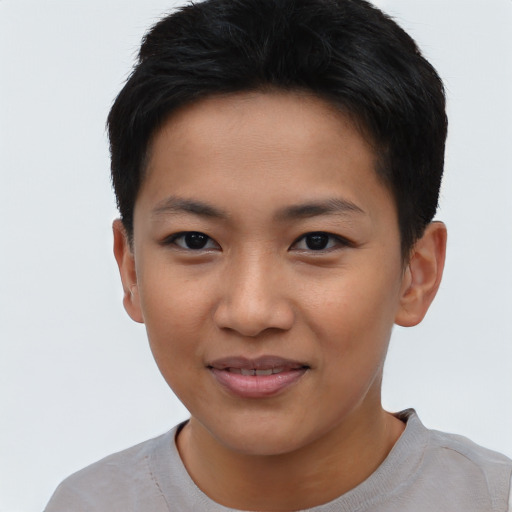 Joyful asian young-adult female with short  black hair and brown eyes