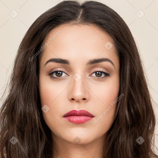 Neutral white young-adult female with long  brown hair and brown eyes