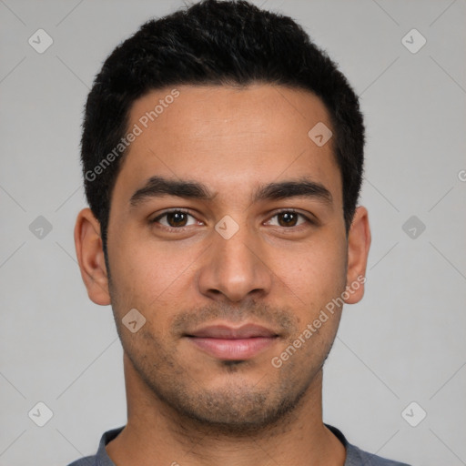 Neutral latino young-adult male with short  black hair and brown eyes