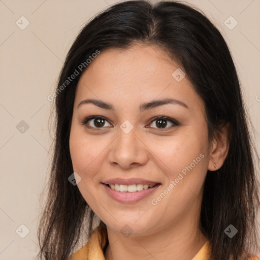 Joyful latino young-adult female with long  brown hair and brown eyes