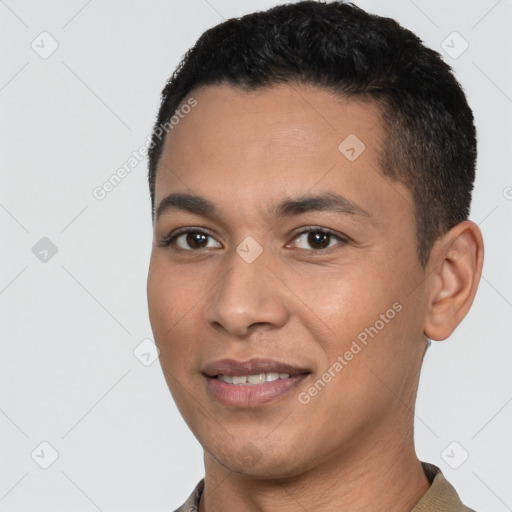 Joyful white young-adult male with short  black hair and brown eyes