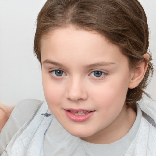 Joyful white child female with medium  brown hair and brown eyes