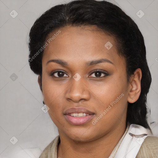 Joyful black young-adult female with medium  brown hair and brown eyes