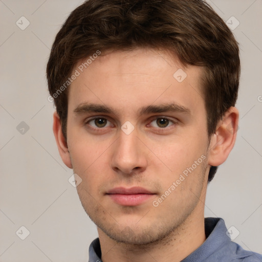 Neutral white young-adult male with short  brown hair and grey eyes