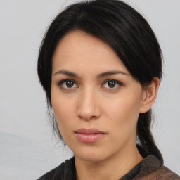 Neutral asian young-adult female with medium  brown hair and brown eyes