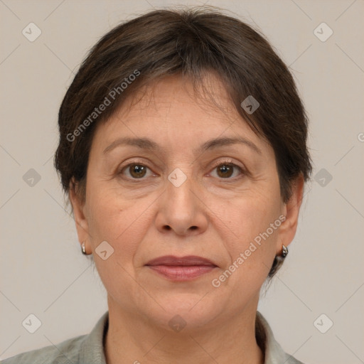 Joyful white adult female with short  brown hair and brown eyes