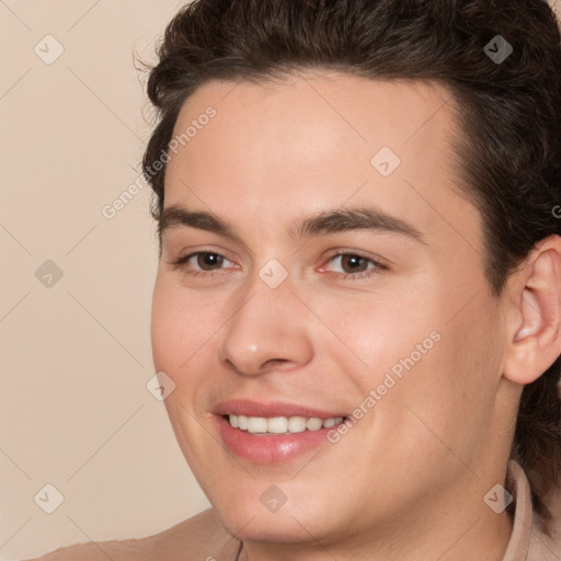 Joyful white young-adult male with medium  brown hair and brown eyes