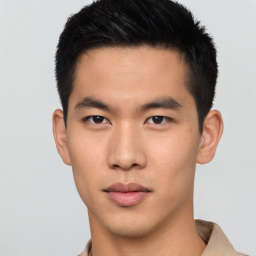 Neutral asian young-adult male with short  brown hair and brown eyes