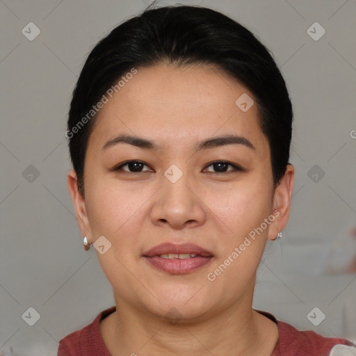 Joyful asian young-adult female with short  brown hair and brown eyes